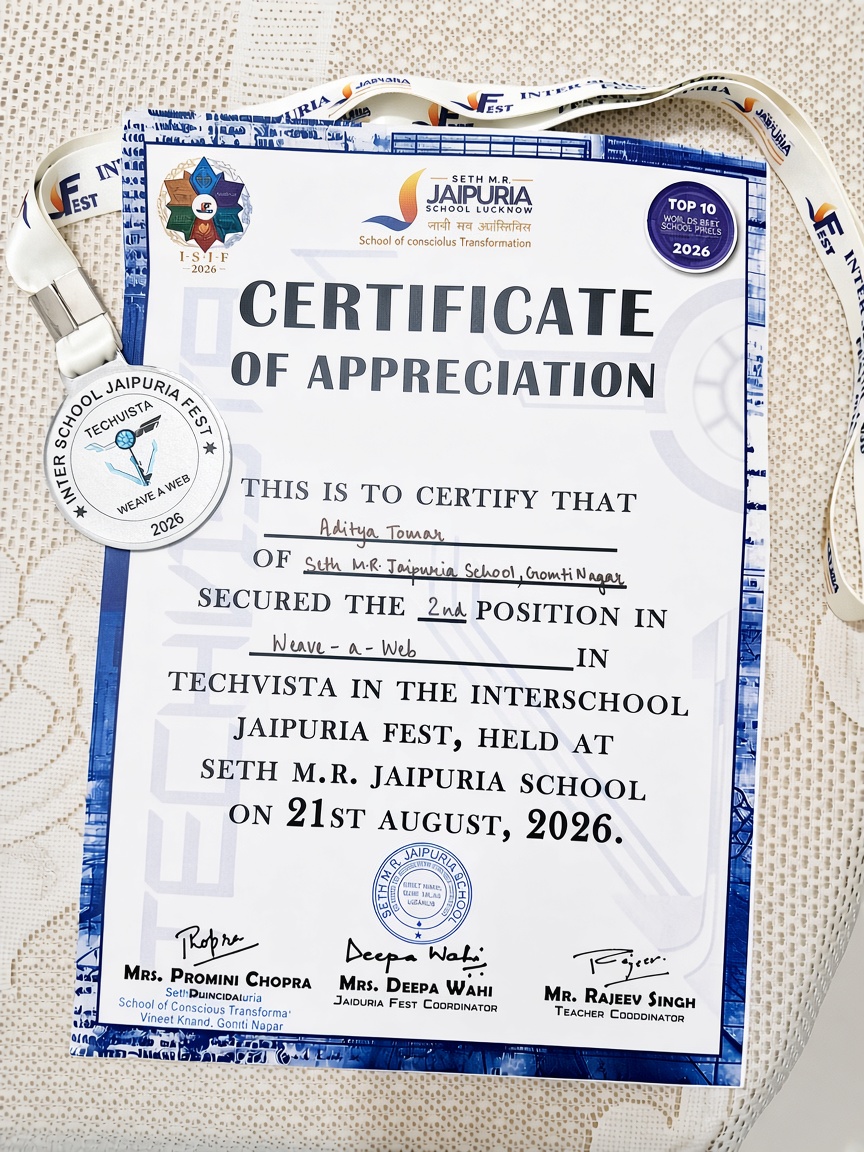 Aditya Tomar winning the Weave-a-Web web-building competition award with certificate and medal